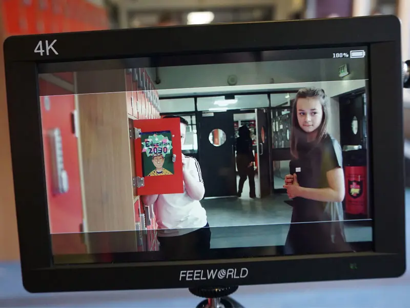 Looking through a screen at a scene in progress for a students film.
